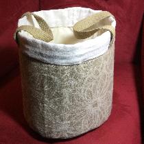 Linen buckets for bathroom towels, soaps and guest items.  The jacquard linen used on the main b...